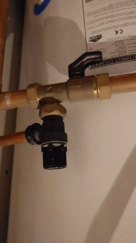 Gas Engineer Working on Boiler