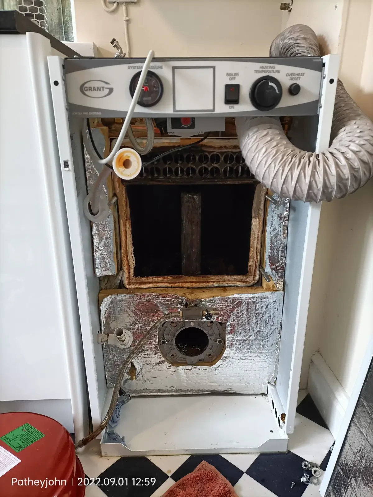 Local Exeter heating engineer carrying out an annual boiler service in Devon