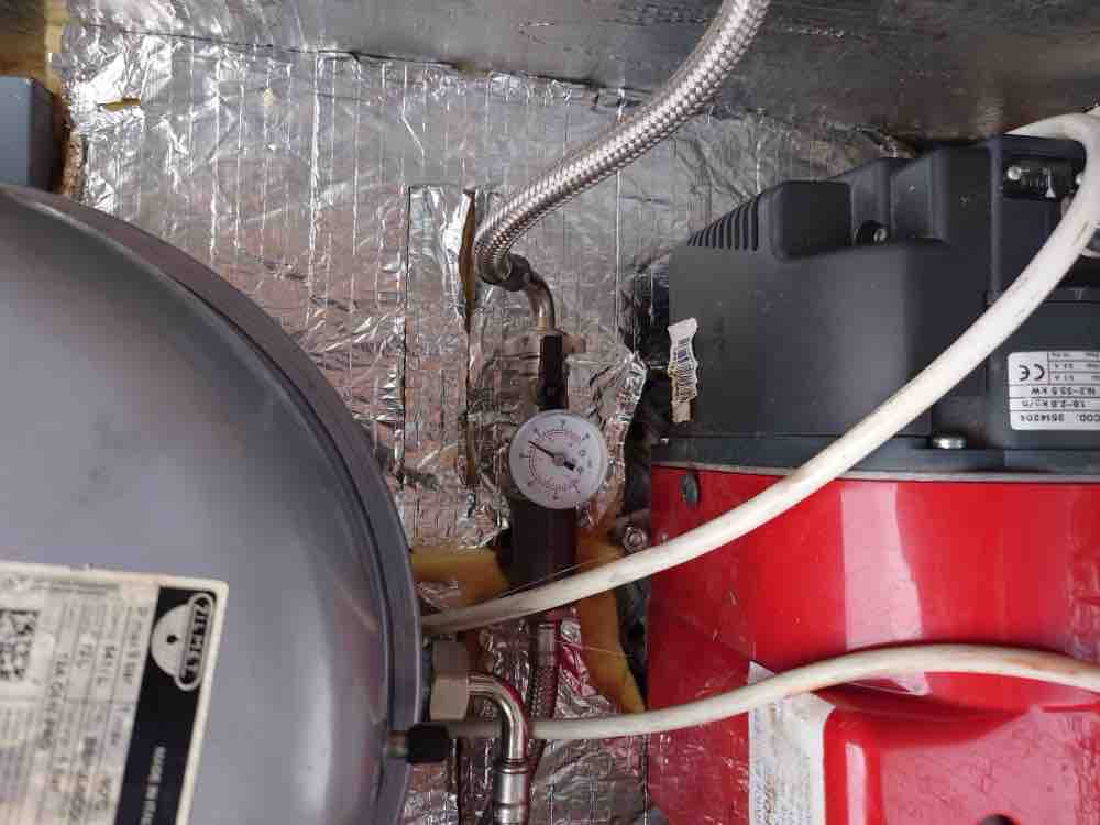 Our heating engineer servicing an oil boiler in Exeter