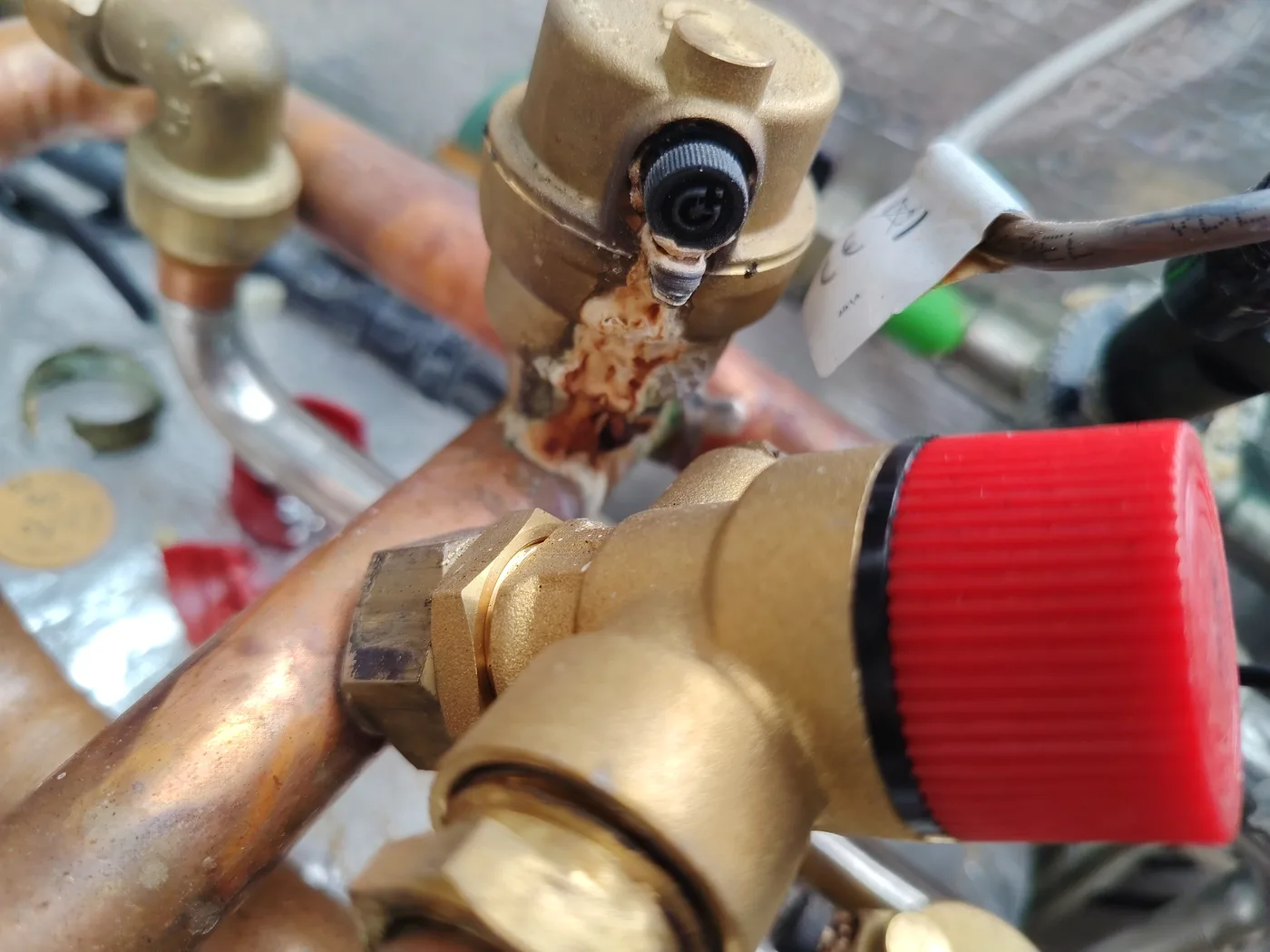 Leaking scaled-up water flow switch on a Grant combi oil boiler in Exeter