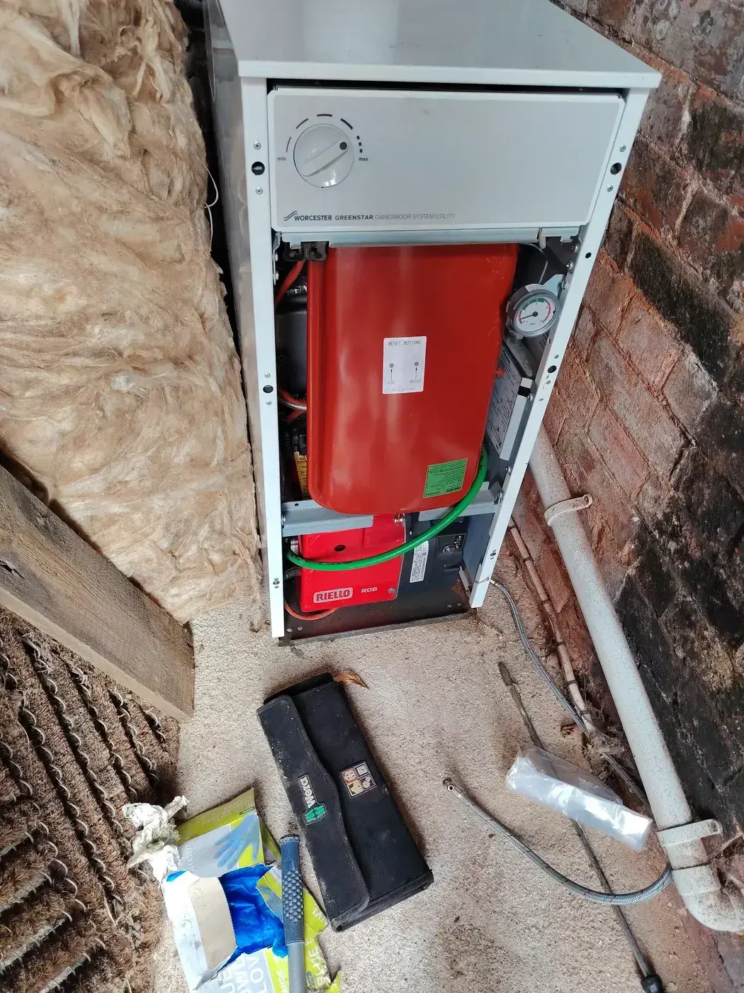 Worcester Heatslave 2 oil boiler stripped down to access the leaking heat exchanger manifold during a repair in Kingsteignton