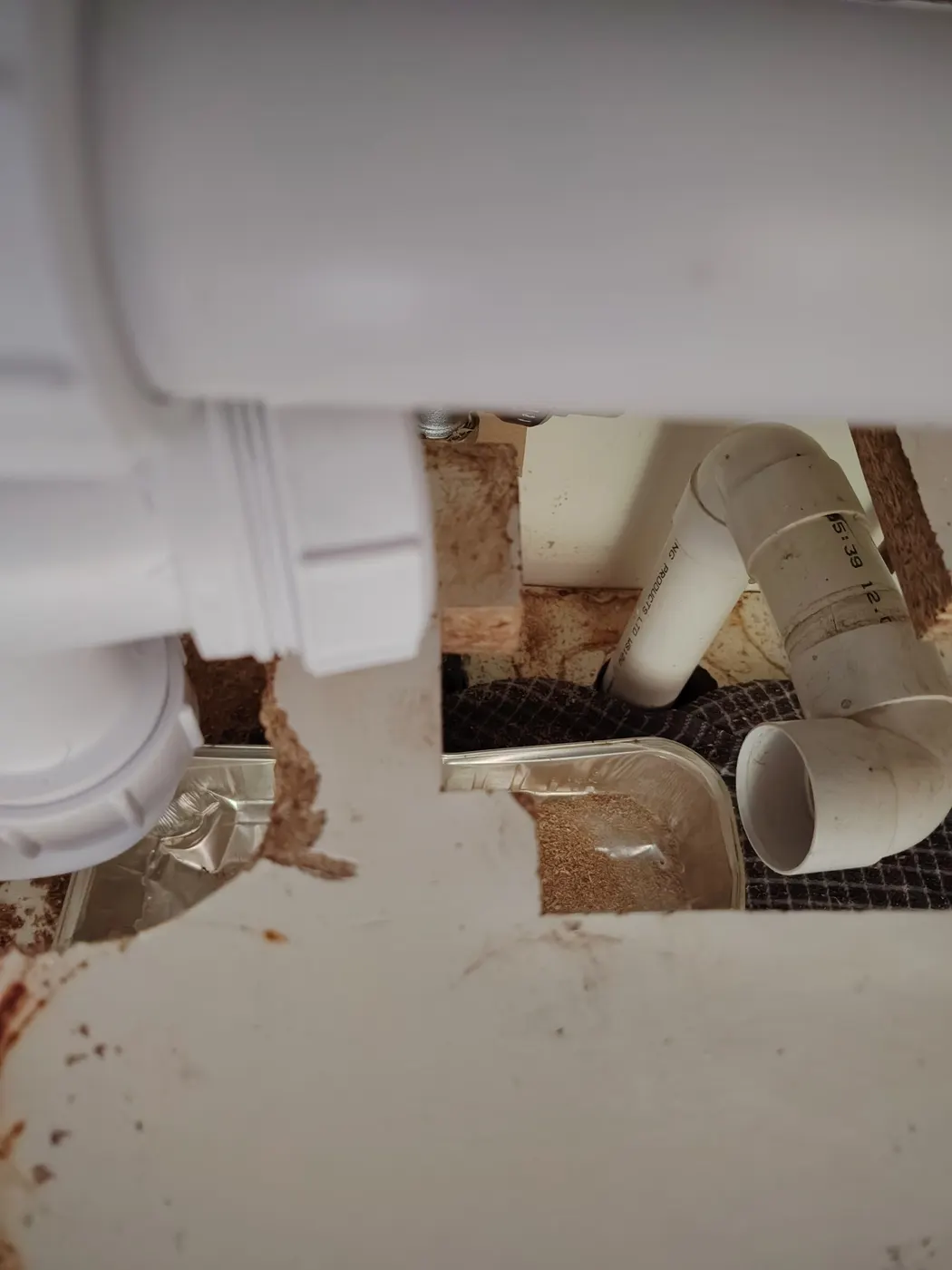 New 90-degree bend fitted to the kitchen sink waste pipe in Exminster